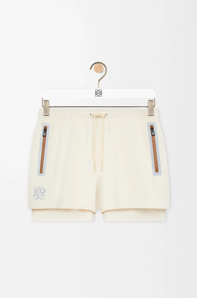 performance shorts in technical shell ivory