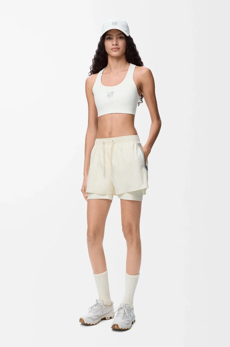 performance shorts in technical shell ivory